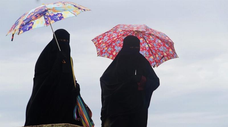 NextImg:Muslim women forced to remove their hijabs for mugshots score a $17.5 million win from NYC taxpayers