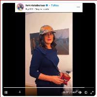 Whitmer mocks Catholicism in a Harris/Walz cap, dispensing a Dorito as a 'Eucharist' to a leftist internet 'influencer'