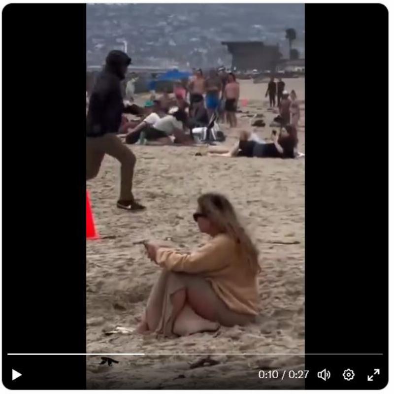 NextImg:Illegals land speedboat and barrel through crowded sand at San Diego's Ocean Beach