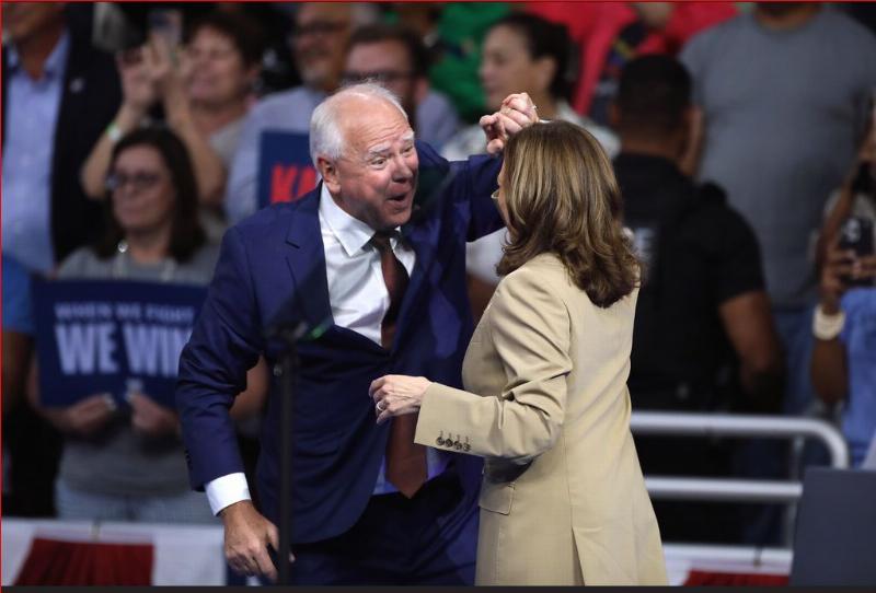 NextImg:Walz told high schoolers communism was a system where 'everyone shares'