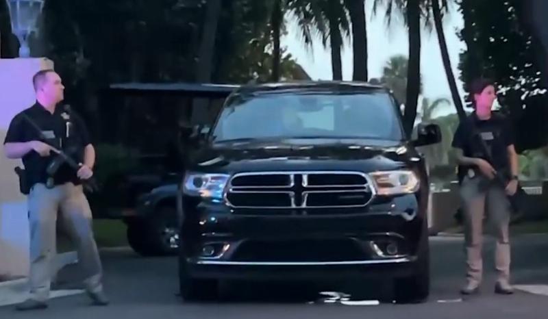NextImg:A law enforcement officer looks at the use-of-force policy for the raid on Mar-a-Lago