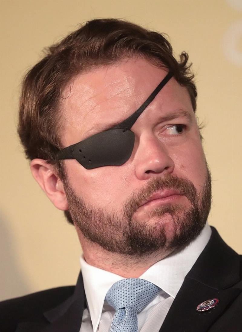 NextImg:Why Does Dan Crenshaw want to kill Tucker Carlson?