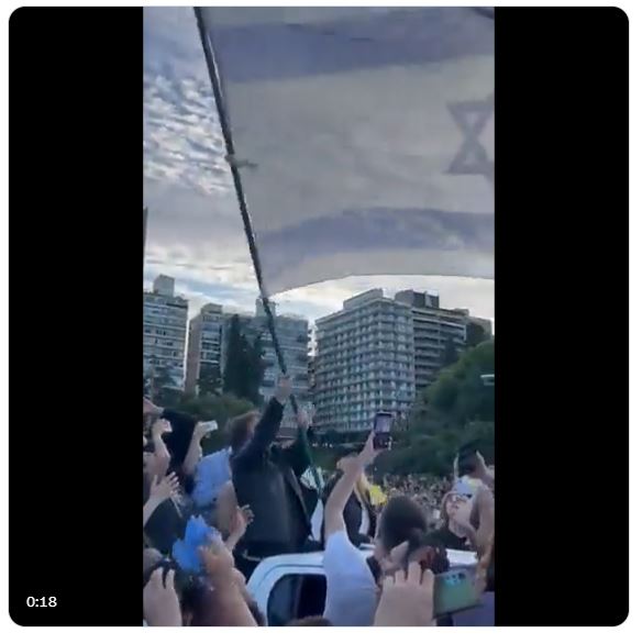 Three days before Argentina's presidential election, frontrunner Milei waves a gigantic Israel flag at huge campaign rally