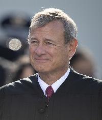 Chief Justice John Roberts decides to keep Peter Navarro in jail