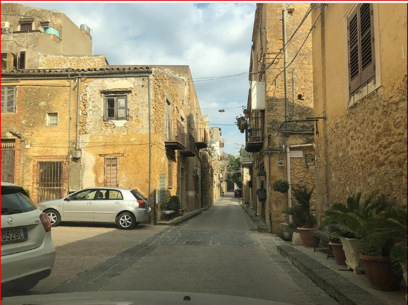 NextImg:Sicily locals outraged after deportable illegal brazenly eats neighborhood dog