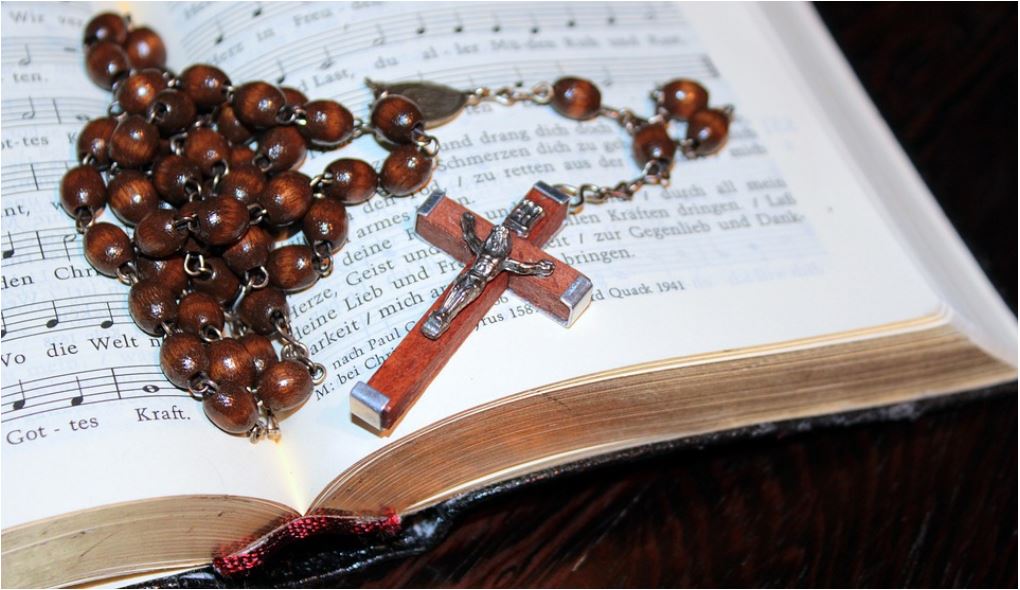 It'll take more than carrying a rosary