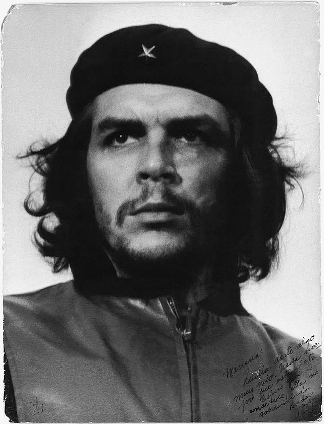 Tim Walz cabinet pick deletes photo from social media showing walls adorned with images of Mao Zedong and Che Guevara