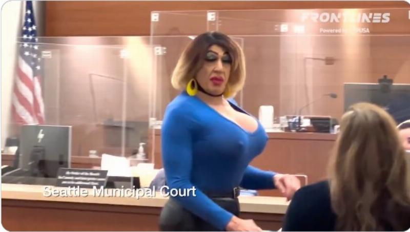 NextImg:In Seattle, a male lawyer with sex doll breasts and clown lips, appears in court