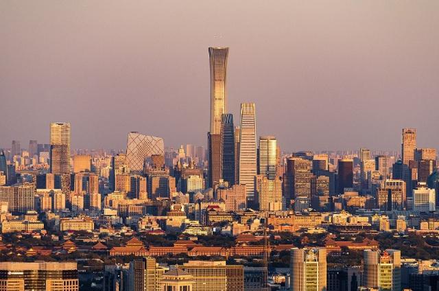 <p><em>Image: N509FZ via <a href="https://commons.wikimedia.org/wiki/File:Skyline_of_Beijing_CBD_with_B-5906_approaching_%2820211016171955%29.jpg">Wikimedia Commons</a>, <a href="https://creativecommons.org/licenses/by-sa/4.0/deed.en">CC BY-SA 4.0</a>.</em></p>