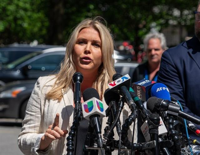 <p><i>Image: BruceSchaff via <a href="https://commons.m.wikimedia.org/wiki/File:Karoline_Leavitt_addresses_press_outside_Trump_trial_in_New_York_05-28-24.jpg">Wikimedia Commons</a>, <a href="https://creativecommons.org/licenses/by-sa/4.0/deed.en">CC BY-SA 4.0</a> (cropped).</i></p>